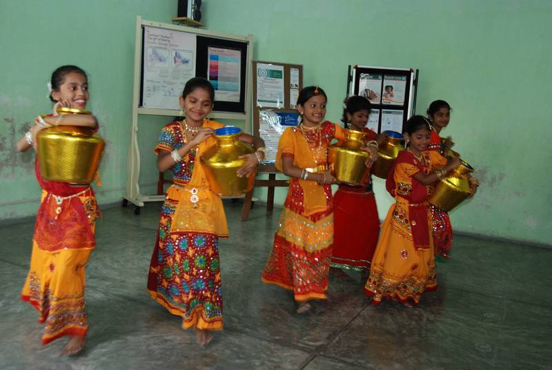 Colourful Dancing Radhas with their waterpots